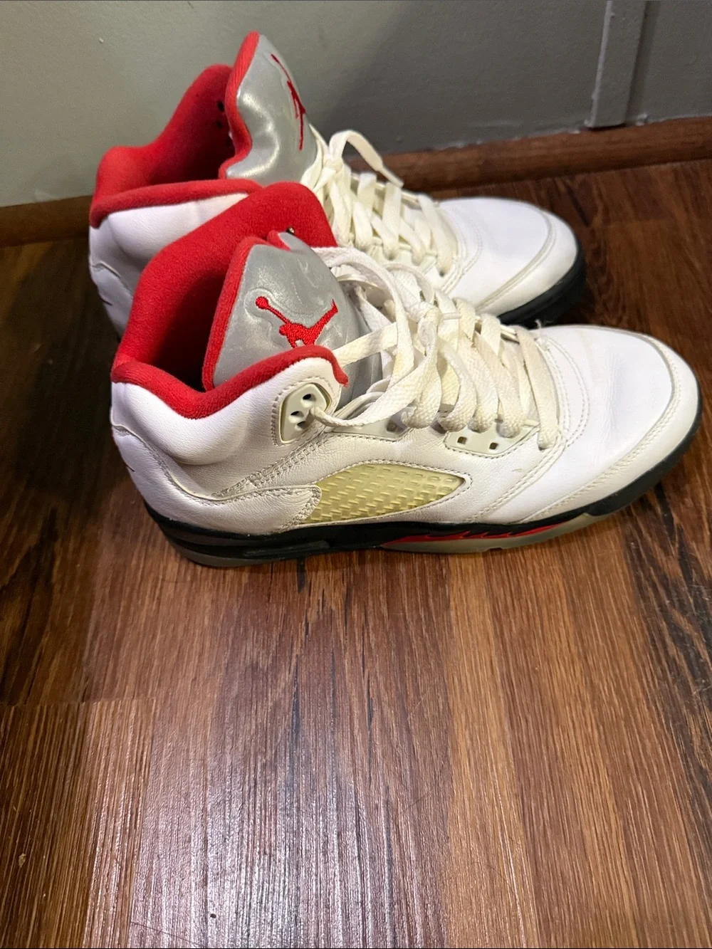 Nike Kids' White and Red Basketball Sneakers with Metallic Silver Tongue